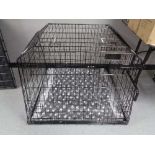 A folding black metal dog cage, height 74 cm, width 98 cm, depth 96 cm.