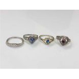 Four sterling silver dress rings (4)