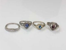 Four sterling silver dress rings (4)