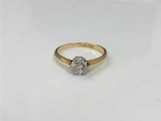 An 18ct gold diamond solitaire ring, the old cut stone weighing approximately 0.75 carat, size N.