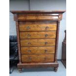 A Victorian mahogany six drawer Scotch chest with pillar column supports.