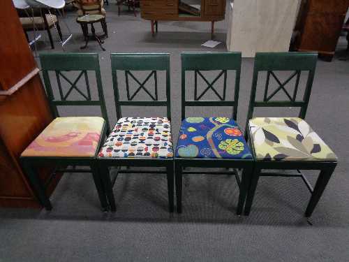 Four painted dining chairs
