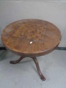 A 19th century mahogany pedestal occasional table with chess board top