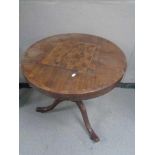 A 19th century mahogany pedestal occasional table with chess board top