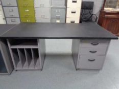 A mid century 'Norwood Steel Equipment' desk with three drawer pedestal and filing storage,