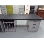 A mid century 'Norwood Steel Equipment' desk with three drawer pedestal and filing storage,