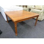 A square oak coffee table