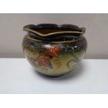 A glazed pottery Ravissant ware planter, diameter 15 cm.