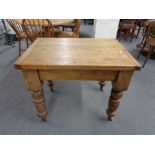 A Victorian pine turn over topped table. Height 74 cm x length 90 cm x width 63 cm.