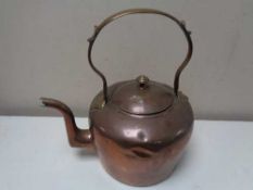 A Victorian copper kettle