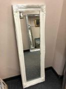 A contemporary narrow framed mirror