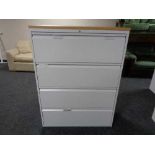 A four drawer metal document cabinet with oak effect top with no key