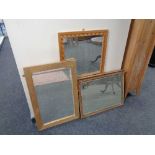 An Edwardian dressing table mirror together with two further mirrors