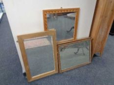 An Edwardian dressing table mirror together with two further mirrors