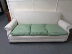 An Edwardian three seater settee