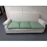 An Edwardian three seater settee