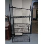 A set of wire metal open shelves, height 184 cm, width 92 cm and depth 46 cm.