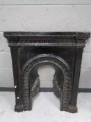 A cast iron fire insert