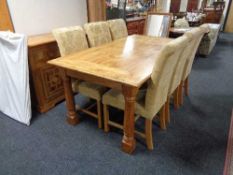 An eight piece Barker and Stonehouse dining room suite comprising of triple door sideboard fitted