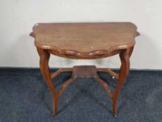 An Edwardian shaped mahogany hall table