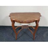 An Edwardian shaped mahogany hall table