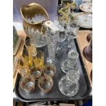 A tray of glass ware, pressed glass water jug, wine glasses,