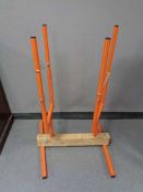 A metal log cutting stand