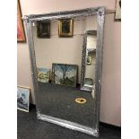 A 5' x 3' chrome framed mirror