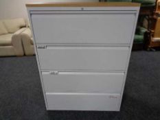 A four drawer metal document cabinet with oak effect top with no key