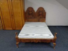 An early twentieth century burr walnut bed frame. Height 140 cm, length 207 cm x width 138 cm.