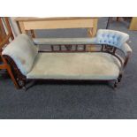 A Victorian mahogany chaise longue