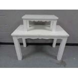 A painted two tier shop display table