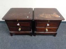 A pair of Stag minstrel two drawer bedside chests