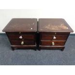 A pair of Stag minstrel two drawer bedside chests