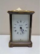 A brass cased carriage clock by Bayard of France
