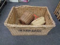 A large wicker hamper together with two baskets and Aldis projector