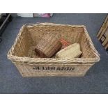 A large wicker hamper together with two baskets and Aldis projector