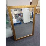 A contemporary gilt framed bevelled mirror