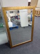 A contemporary gilt framed bevelled mirror