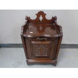 An Edwardian mahogany coal receiver with liner and shovel