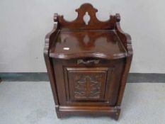 An Edwardian mahogany coal receiver with liner and shovel