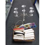 A large metal five way candelabrum together with a box of wall light,