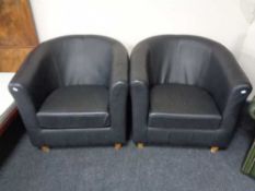 A pair of contemporary tub chairs