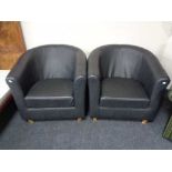 A pair of contemporary tub chairs