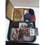 A tray of costume jewellery, beaded necklaces, gent's cufflinks, brooches,