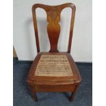 A mahogany bergere seated commode chair