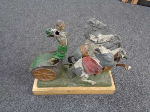 An antique spelter figure on chariot with two rearing horses (Af)