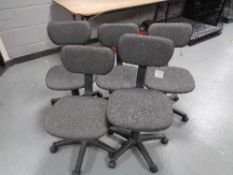 Five grey swivel typist chairs