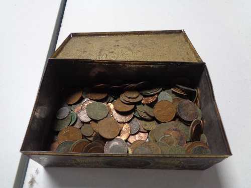 A vintage tin of coins,