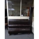 A brown leather 4'6 sleigh bed